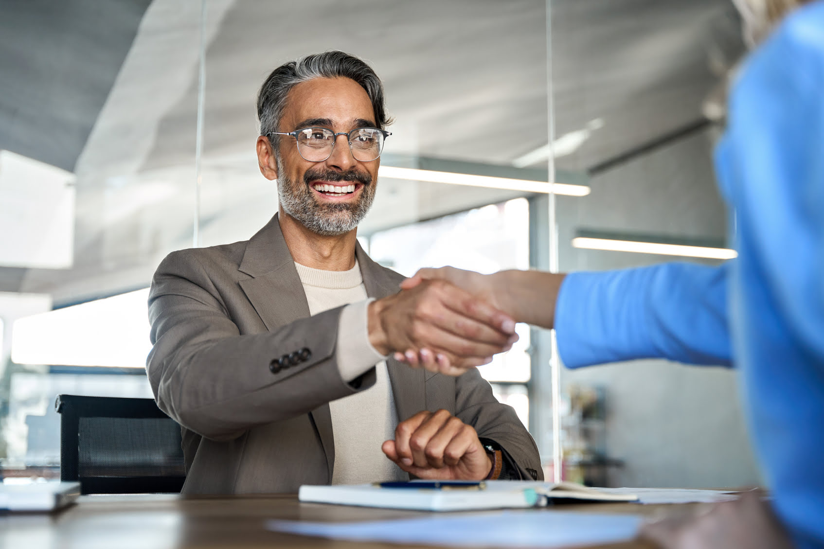 handshake between two people